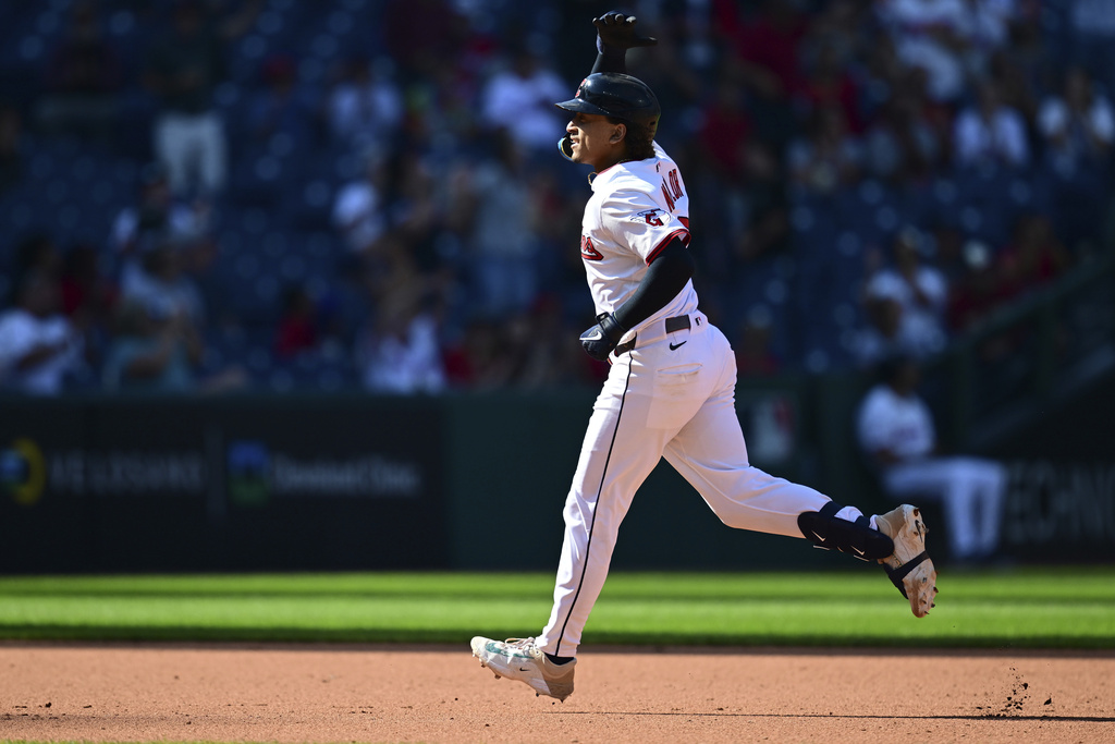 Cleveland Guardians' Bo Naylor runs the bases after hitting a solo home run off Chicago White Sox relief pitcher Brandon Eisert during the seventh inning of a baseball game, Sunday, Sept. 14, 2025, in Cleveland. (AP Photo/David Dermer)