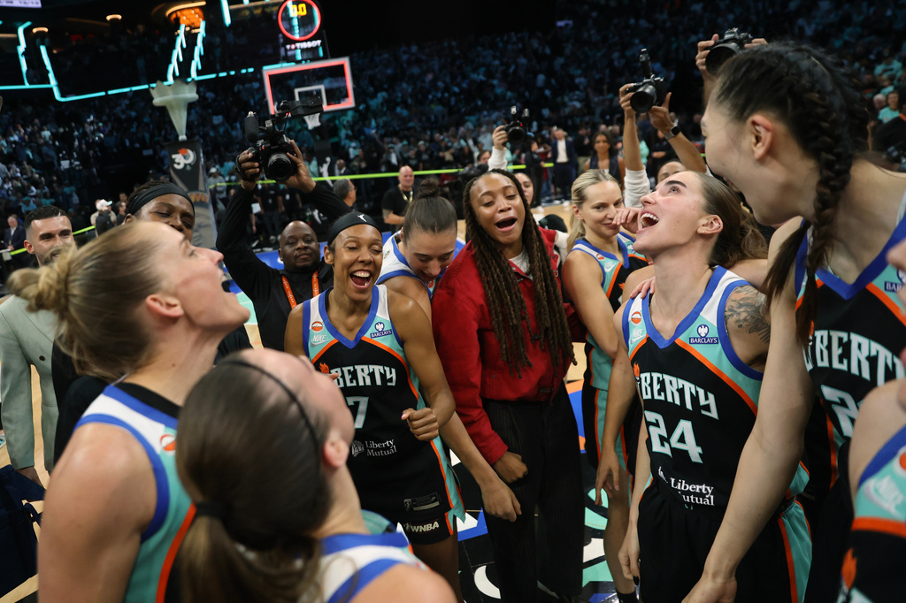 New York Liberty players huddle after winning Game 2 of a WNBA basketball first-round playoff series against the Minnesota Lynx, Tuesday, Sept. 29, 2026, in New York. (AP Photo/Heather Khalifa)