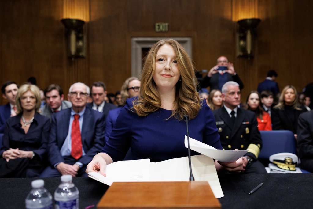 Dr. Casey Means takes her seat at the start of a Senate Health, Education Labor and Pension Committee confirmation hearing for U.S. Surgeon General on Capitol Hill Wednesday, Feb. 25, 2026, in Washington. (AP Photo/Tom Brenner)