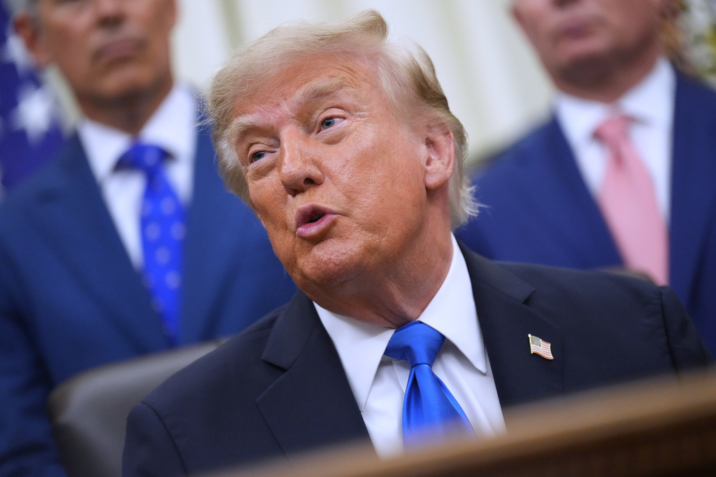 President Donald Trump speaks to reporters in the Oval Office of the White House during a meeting with travel executives, Wednesday, Sept. 2, 2026, in Washington. (AP Photo/Jacquelyn Martin)