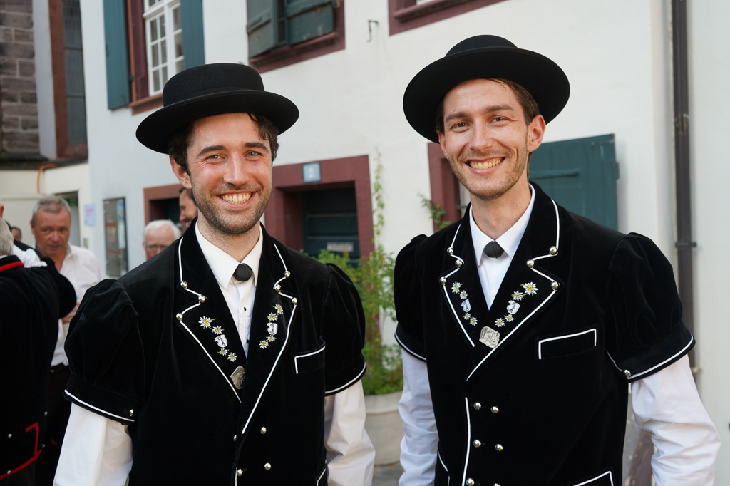 Freddie Byars from the UK and Freddie Conquer from New Zealand representing Jodler club Echo Basel as they pose outside at the Martins church in Basel, Switzerland, Saturday, June 27, 2026. (AP Photo/Jez Fielder)