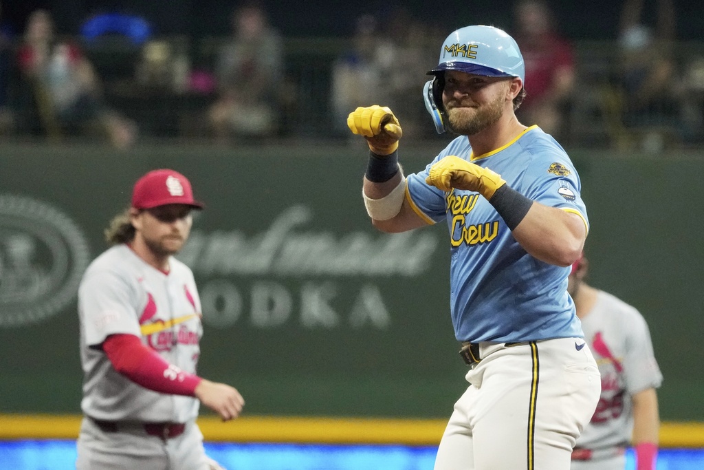 Milwaukee Brewers' Jake Bauers reacts after hitting an RBI double during the fourth inning of a baseball game against the St. Louis Cardinals Friday, Sept. 12, 2025, in Milwaukee. (AP Photo/Morry Gash)