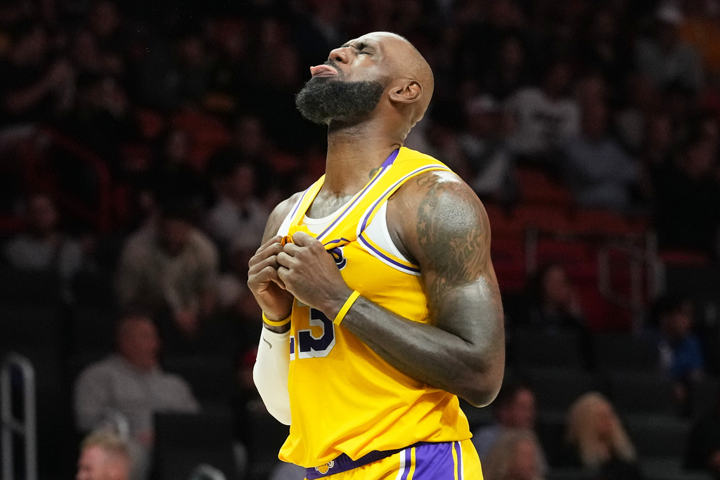 Los Angeles Lakers forward LeBron James reacts after the Lakers defeated the Miami Heat in an NBA basketball game, Thursday, March 19, 2026, in Miami. (AP Photo/Lynne Sladky)