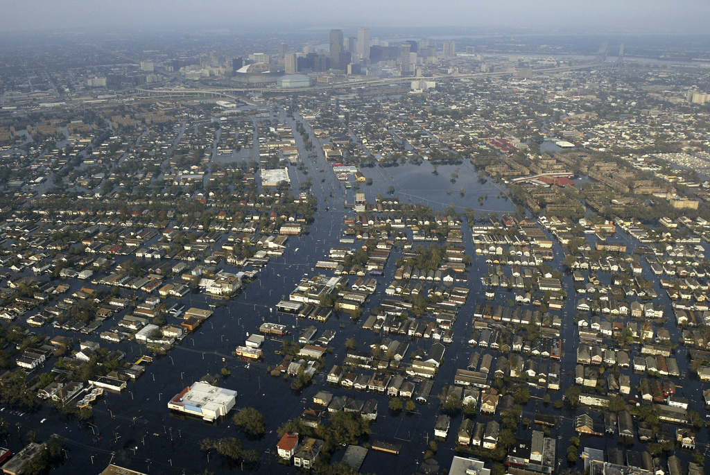 FILE - Floodwaters from Hurricane Katrina fill the streets of New Orleans, Sept. 1, 2005. (AP Photo/David J. Phillip, Pool, File)
