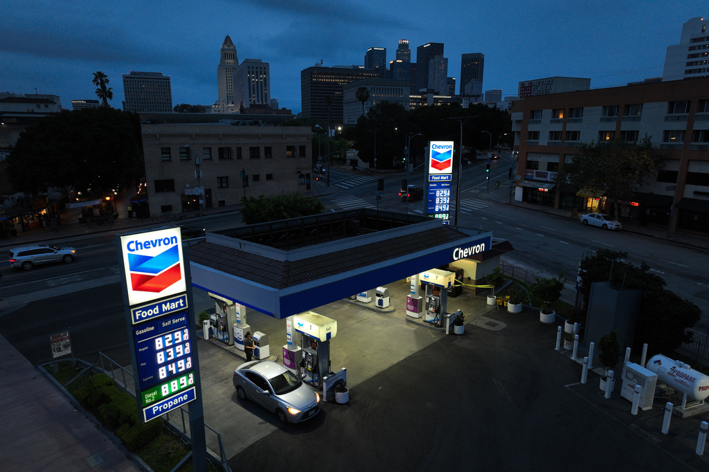 Gas prices are displayed at a Chevron gas station, in downtown Los Angeles, Tuesday, March 31, 2026. (AP Photo/Jae C. Hong)