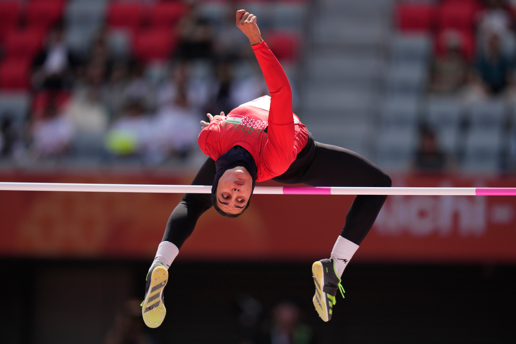 Iran's Fatemeh Mohitzadeh competes in the women's heptathlon high jump at the Asian Games in Nagoya, Japan, Thursday, Sept. 24, 2026. (AP Photo/Dita Alangkara)