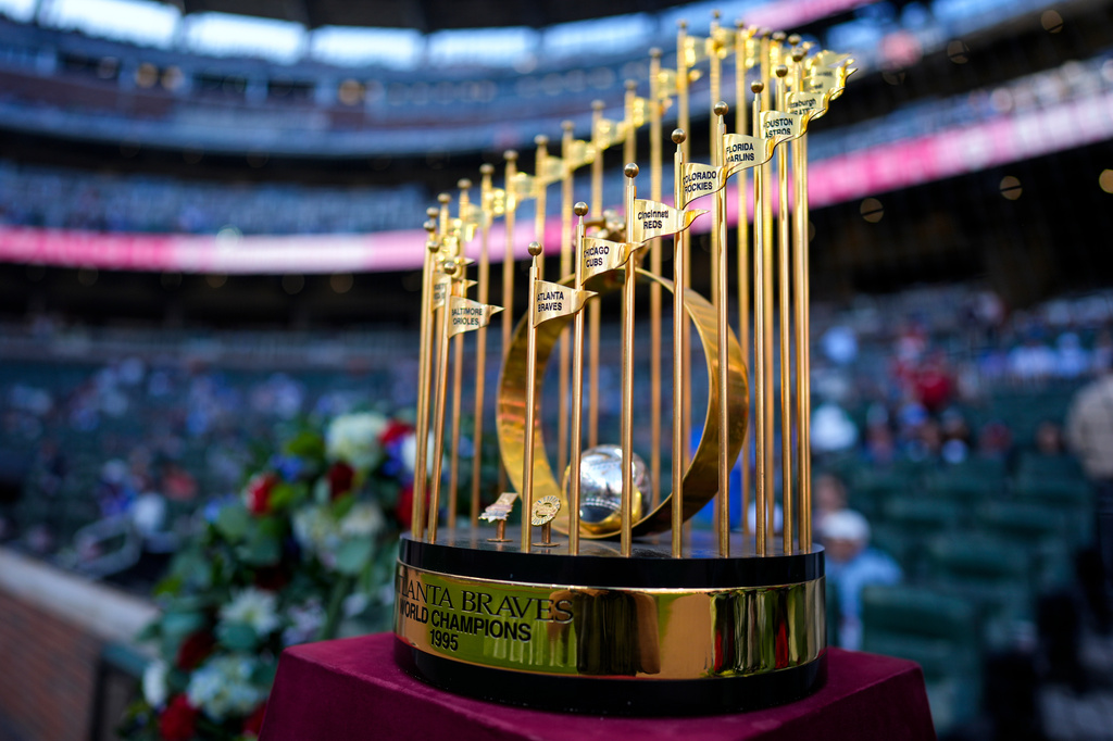 The 1995 World Championship trophy is seen during a tribute to former manager Bobby Cox before a baseball game between the Atlanta Braves and the Chicago Cubs, Tuesday, May 12, 2026, in Atlanta. (AP Photo/Mike Stewart)