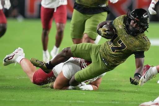 Miami wide receiver Tony Johnson (17) runs for a first down during the first half of an NCAA college football game against Stanford, Saturday, Oct. 25, 2025, in Miami Gardens, Fla. (AP Photo/Lynne Sladky) Miami wide receiver Tony Johnson (17) runs for a first down during the first half of an NCAA college football game against Stanford, Saturday, Oct. 25, 2025, in Miami Gardens, Fla. (AP Photo/Lynne Sladky)