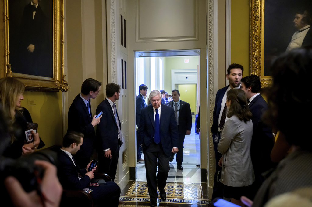 Sen. Lindsey Graham, R-S.C., makes his way to the Senate chamber for a vote at the Capitol, Tuesday, May 19, 2026, in Washington. (AP Photo/Rod Lamkey, Jr.)