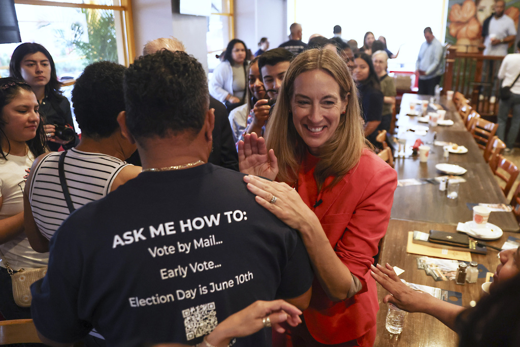 FILE - Rep. Mikie Sherrill, D-N.J., greets people during a "Get Out the Vote" rally June 7, 2025, in Elizabeth, N.J. (AP Photo/Heather Khalifa, File)