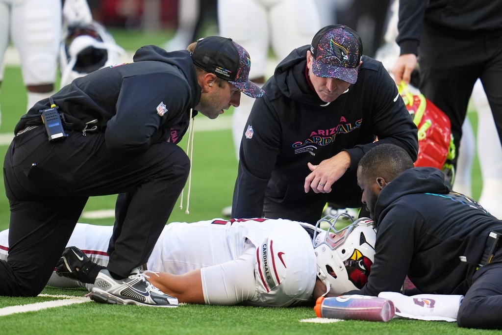 Arizona Cardinals' Travis Vokolek is injured during the first half of an NFL football game against the Indianapolis Colts Sunday, Oct. 12, 2025, in Indianapolis. (AP Photo/Michael Conroy)