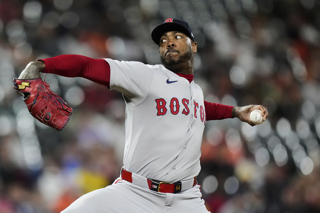 Boston Red Sox relief pitcher Aroldis Chapman delivers during the ninth inning of a baseball game against the Baltimore Orioles, Wednesday, Aug. 27, 2025, in Baltimore. (AP Photo/Stephanie Scarbrough)