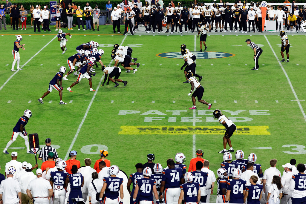 The YellaWood logo on Pat Dye Field as Auburn plays Missouri during the second half of an NCAA college football game, Saturday, Oct. 18, 2025, in Auburn, Ala. (AP Photo/Butch Dill)
