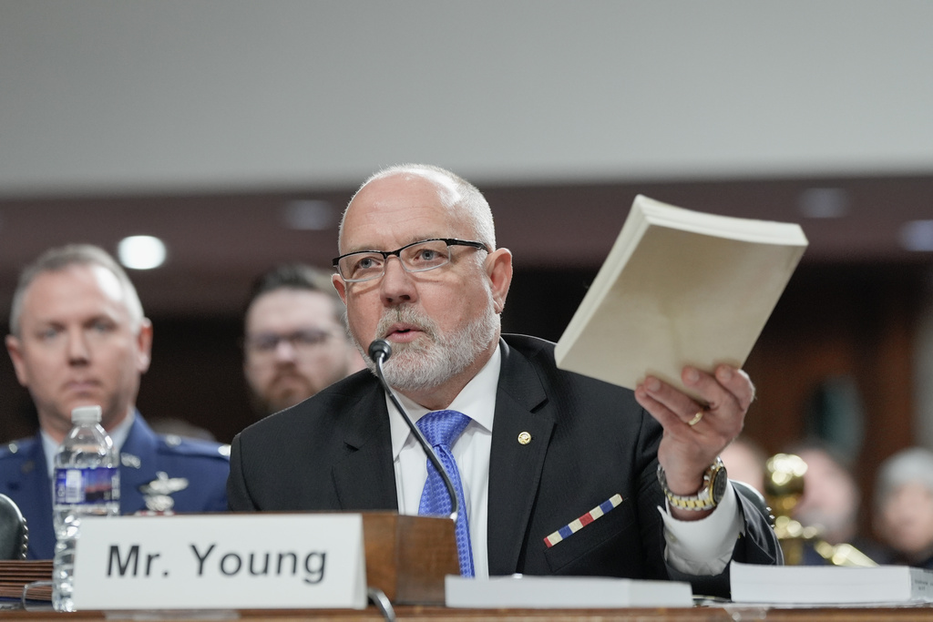 Charles Young III, principal deputy general counsel for the Defense Department, testifies during a Senate Armed Services Committee hearing on homeland security, Thursday, Dec. 11, 2025, in Washington. (AP Photo/Mariam Zuhaib)