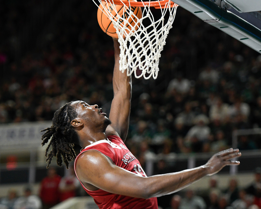 Miami (Ohio)forward Antwone Woolfolk makes a basket during the first half of an NCAA college basketball game against Ohio, Friday, March 6, 2026, in Athens, Ohio. (AP Photo/HG Biggs)