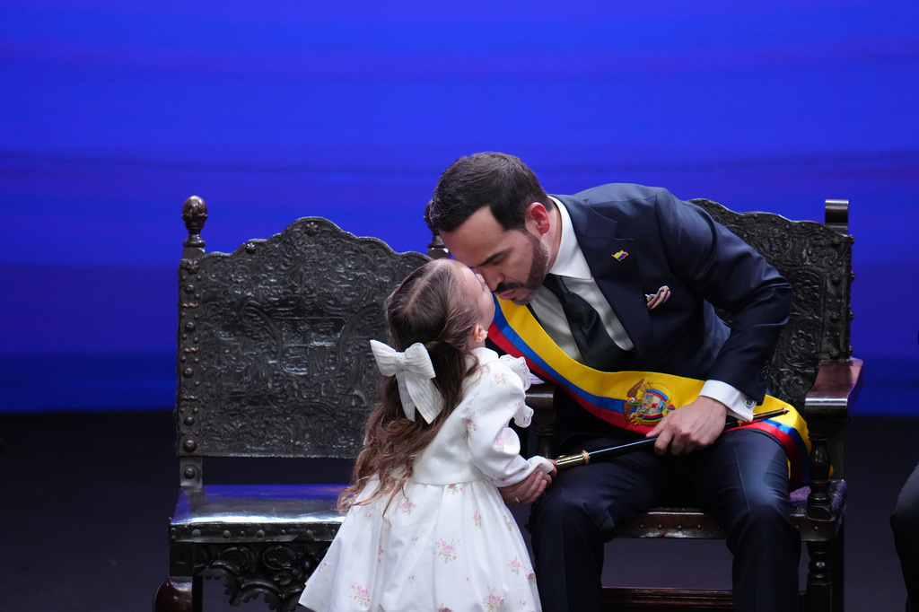 Francesca kisses her father, Colombia's President Abelardo de la Espriella, after he took the oath of office in Cali, Colombia, Friday, Aug. 7, 2026. (AP Photo/Matias Delacroix)