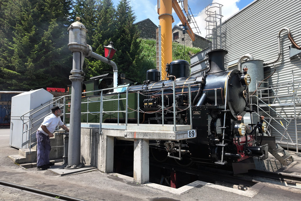 Bernhard Lang, volunteer train driver, prepares a steam locomotive at the DFB (Dampfbahn Furka‑Bergstrecke) depot in Realp, Switzerland, Friday, June 26, 2026. (AP Photo/Niccolo Lupone)