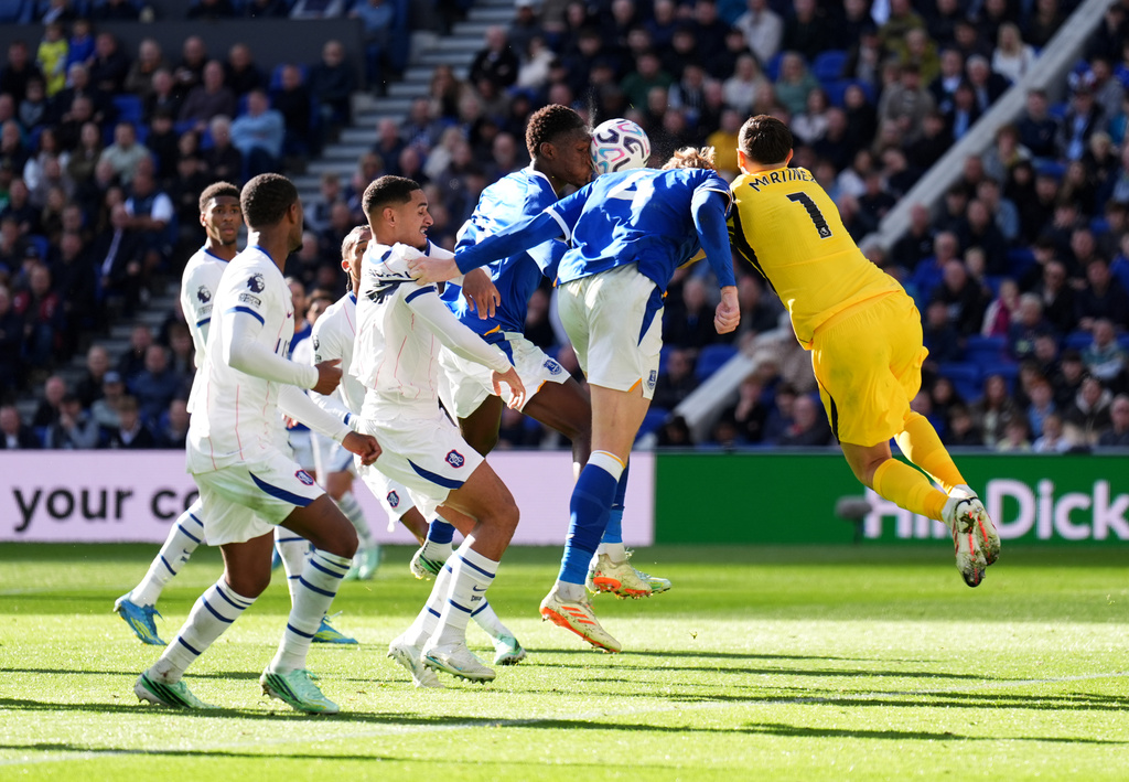 Chelsea goalkeeper Emiliano Martinez, right, picks up an injury during the English Premier League soccer match between Everton and Chelsea in Liverpool, England, Saturday, Oct. 17, 2026. (Mike Egerton/PA via AP)