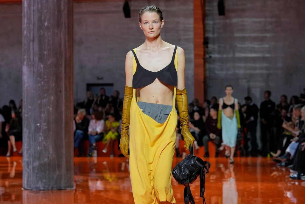 A model wears a creation as part of the Prada Spring/Summer 2026 collection presented in Milan, Italy, Thursday, Sept. 25, 2025. (AP Photo/Luca Bruno)
