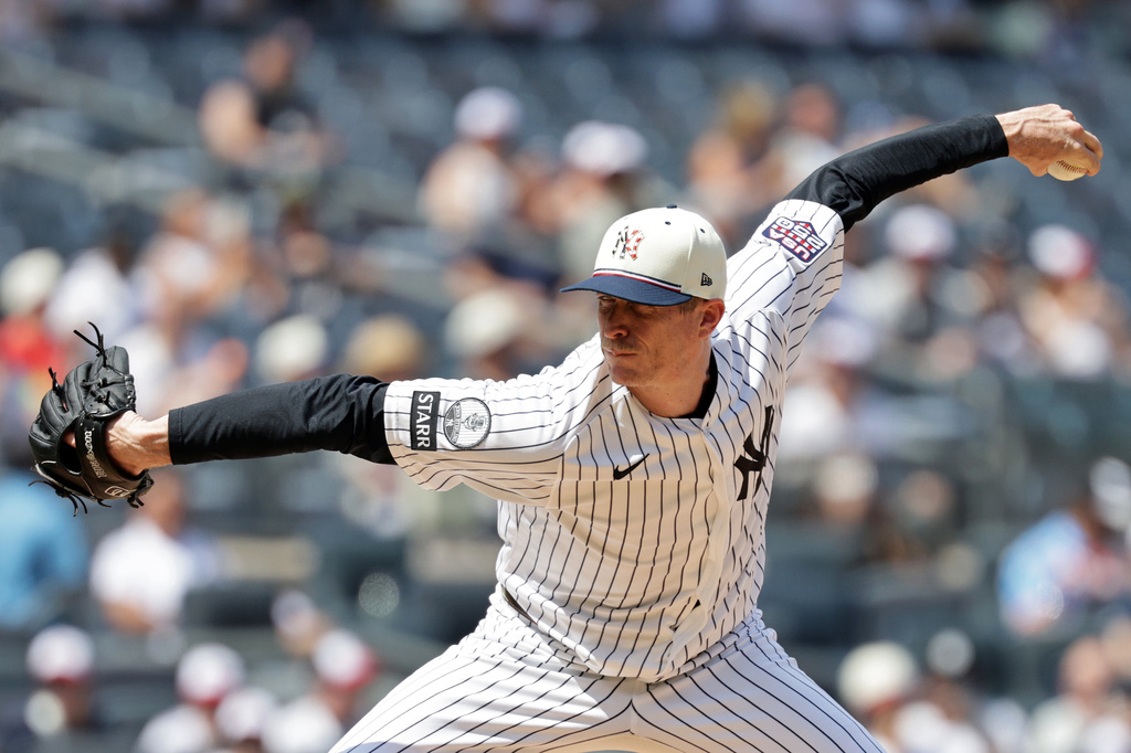 New York Yankees pitcher Tim Hill (41) delivers during the fourth inning of a baseball game against the Minnesota Twins, Saturday, July 4, 2026, in New York. (AP Photo/Adam Hunger)