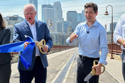 Incumbent Democratic Minneapolis Mayor Jacob Frey, right, and Democratic Minnesota Gov. Tim Walz, left, attend a ribbon-cutting ceremony for the reopening of the renovated Stone Arch Bridge across the Mississippi River in downtown Minneapolis on July 21, 2025. (AP Photo/Steve Karnowski) Incumbent Democratic Minneapolis Mayor Jacob Frey, right, and Democratic Minnesota Gov. Tim Walz, left, attend a ribbon-cutting ceremony for the reopening of the renovated Stone Arch Bridge across the Mississippi River in downtown Minneapolis on July 21, 2025. (AP Photo/Steve Karnowski)