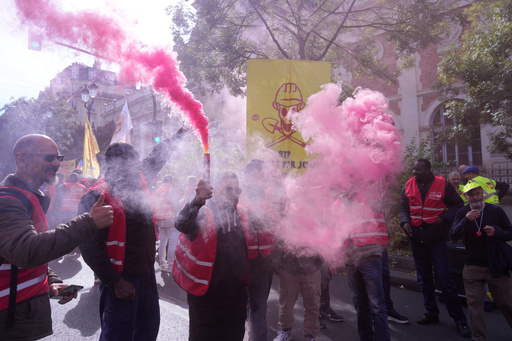 Unionists use flares during a new round of strikes and protests against the caretaker government and cost-cutting Thursday, Oct. 2, 2025 in Paris. (AP Photo/Michel Euler) Unionists use flares during a new round of strikes and protests against the caretaker government and cost-cutting Thursday, Oct. 2, 2025 in Paris. (AP Photo/Michel Euler)