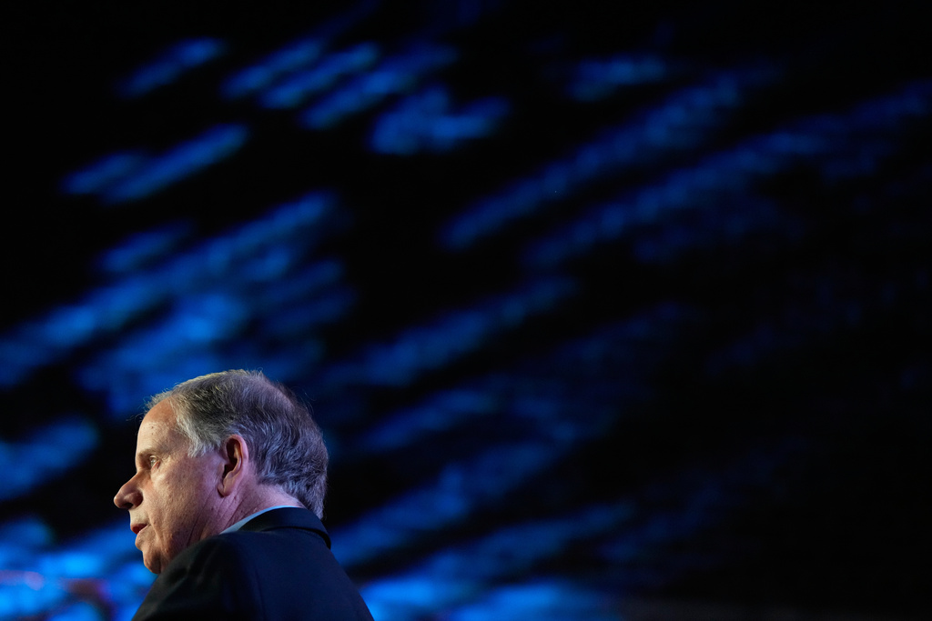 Former Sen. Doug Jones, D-Ala., and gubernatorial candidate speaks during an event Friday, Dec. 12, 2025, in Birmingham, Ala. (AP Photo/Brynn Anderson)