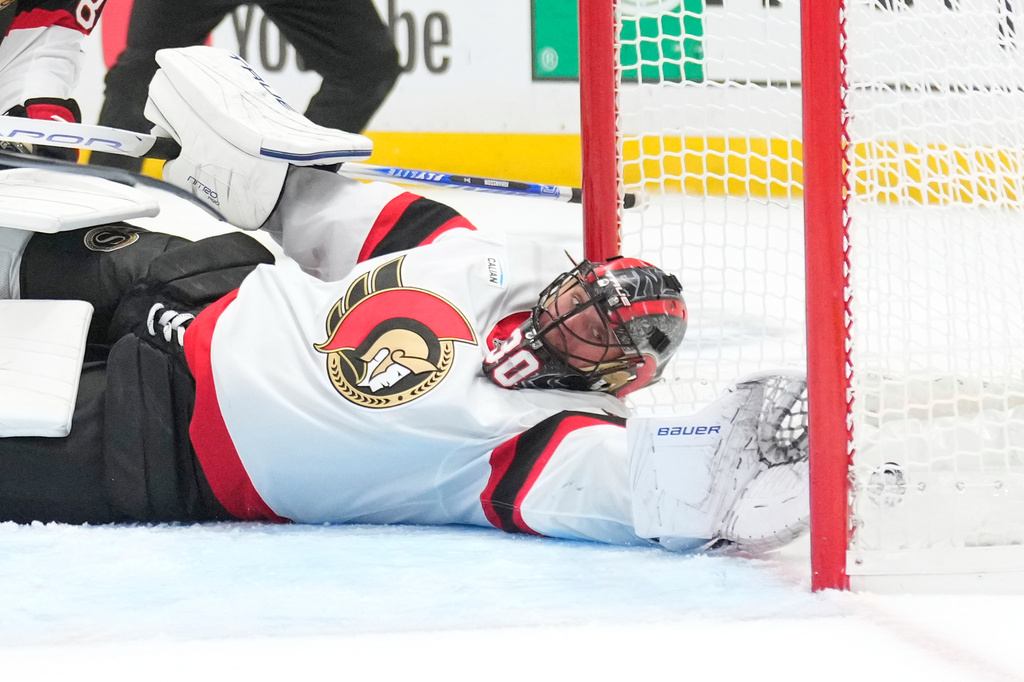 Ottawa Senators goaltender Jonas Johansson can't reach a puck shot by Los Angeles Kings right wing Joel Armia during the second period of an NHL hockey game Thursday, Oct. 29, 2026, in Los Angeles. (AP Photo/Mark J. Terrill)