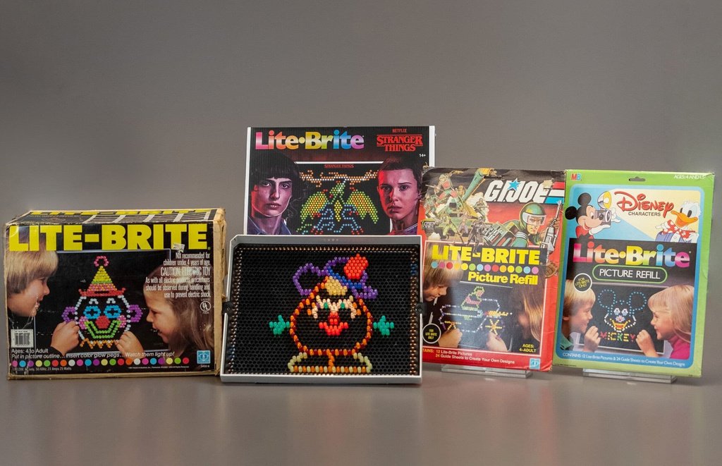 This photo provided by The Strong National Museum of Play shows Lite-Brite toys created by Burt Meyers part of the museum's collection sitting in an arrangement at The Strong National Museum of Play in Rochester, N.Y. (The Strong National Museum of Play via AP)