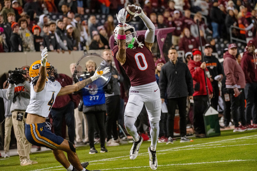 Virginia Tech wide receiver Ayden Greene (0) catches a touchdown during the first half of an NCAA college football game between California and Virginia Tech in Blacksburg, Va., Friday, Oct. 24, 2025. (AP Photo/Robert Simmons) Virginia Tech wide receiver Ayden Greene (0) catches a touchdown during the first half of an NCAA college football game between California and Virginia Tech in Blacksburg, Va., Friday, Oct. 24, 2025. (AP Photo/Robert Simmons)