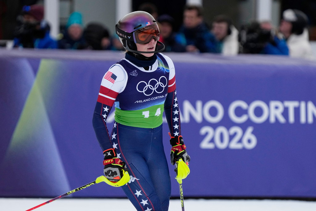 United States' Mikaela Shiffrin reacts at the finish area of an alpine ski, women's team combined race, at the 2026 Winter Olympics, in Cortina d'Ampezzo, Italy, Tuesday, Feb. 10, 2026. (AP Photo/Andy Wong)