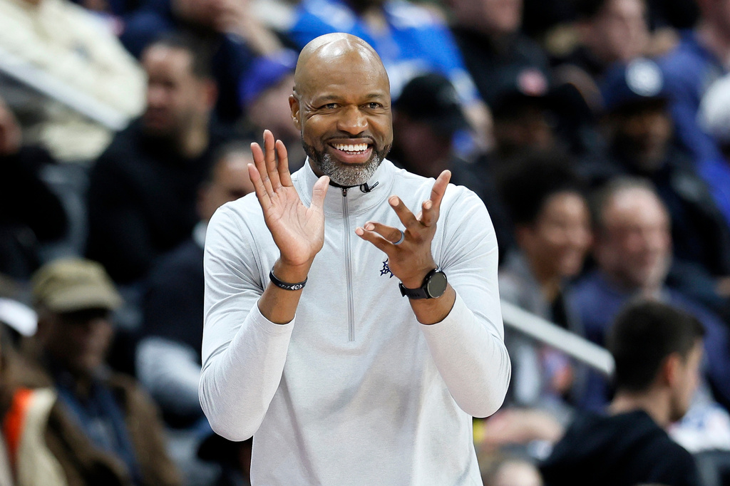 Orlando Magic head coach Jamahl Mosley cheers on his team during the first half in Game 5 of a first-round NBA basketball playoffs series against the Detroit Pistons Wednesday, April 29, 2026, in Detroit. (AP Photo/Duane Burleson)