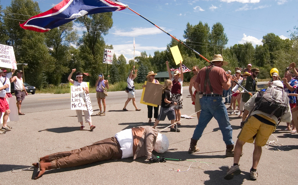 FILE - Participants in a peace rally drag an effigy of Vice President Dick Cheney through the street outside Cheney's home in Jackson, Wyo., Aug. 11, 2007. (Michael G. Seamans,Jackson Hole News & Guide via AP, File)