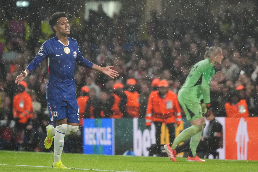 Chelsea's Estevao reacts after scoring from a penalty kick during the UEFA Champions League soccer match between Chelsea and Ajax in London Wednesday, Oct. 22, 2025. (AP Photo/Alastair Grant)