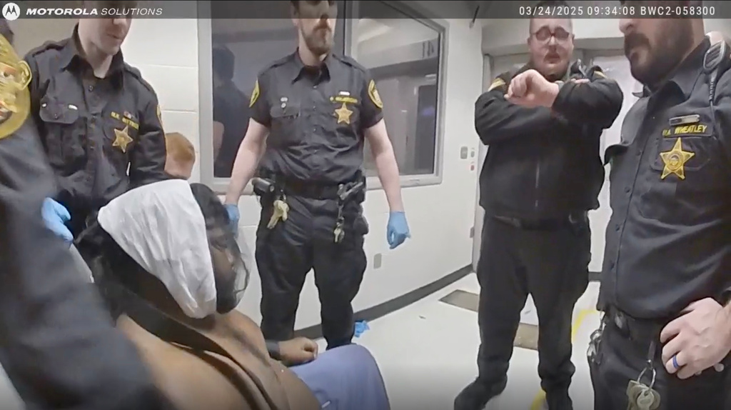 This image taken from video released by the Montgomery County Sheriff's Office, shows law enforcement surrounding Christian Black inside the Montgomery County Jail on March 24, 2025, in Dayton, Ohio. (Montgomery County Sheriff's Office via AP)