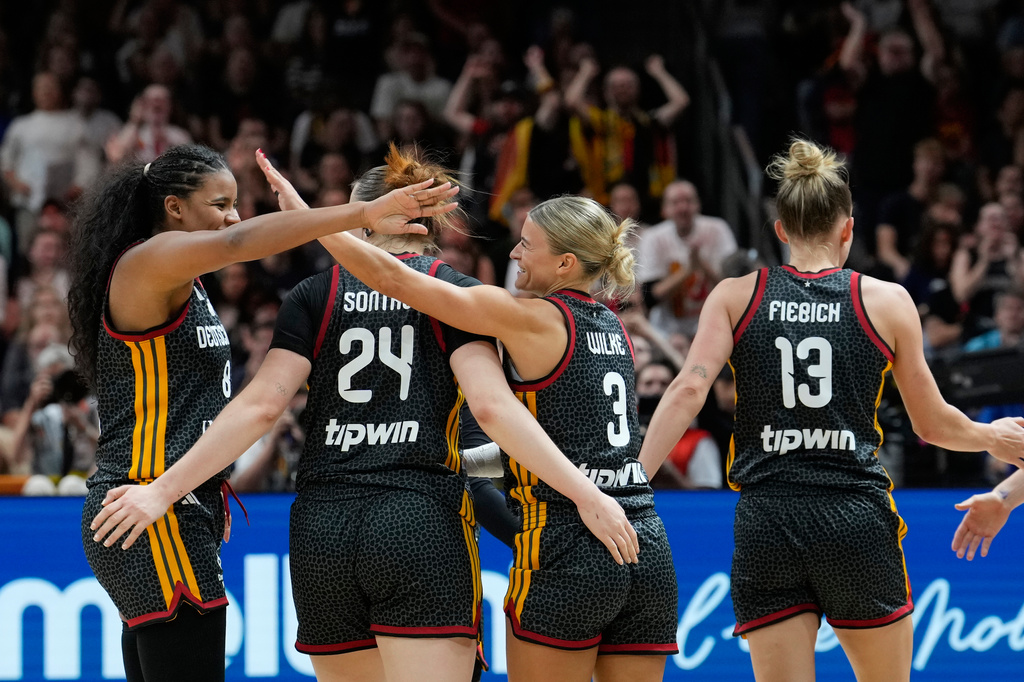 German players react during the Women's Basketball World Cup quarterfinal match between Germany and Belgium in Berlin, Thursday, Sept. 10, 2026. (AP Photo/Ebrahim Noroozi)