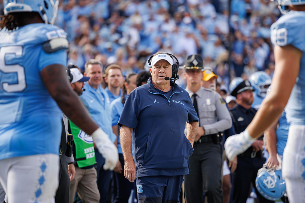 FILE - North Carolina head coach Bill Belichick looks towards the field after the final play in overtime in a loss to Virginia following an NCAA college football game in Chapel Hill, N.C., Oct. 25, 2025. (AP Photo/Ben McKeown, File)