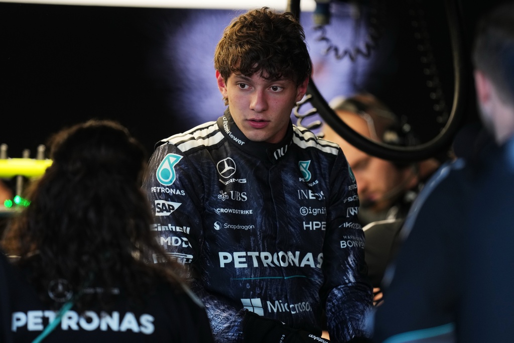 Mercedes driver Andrea Kimi Antonelli of Italy works with his team members in the garage in Suzuka, central Japan, Thursday, March 26, 2026, ahead of Sunday's Japanese Formula One Grand Prix race. (AP Photo/Hiro Komae)