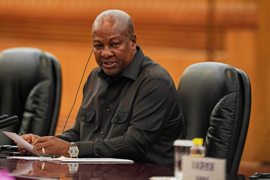FILE - Ghana's President John Mahama speaks during a meeting with Chinese President Xi Jinping at the Great Hall of the People in Beijing, Oct. 14, 2025. (Ichiro Banno/Pool Photo via AP, FILE)