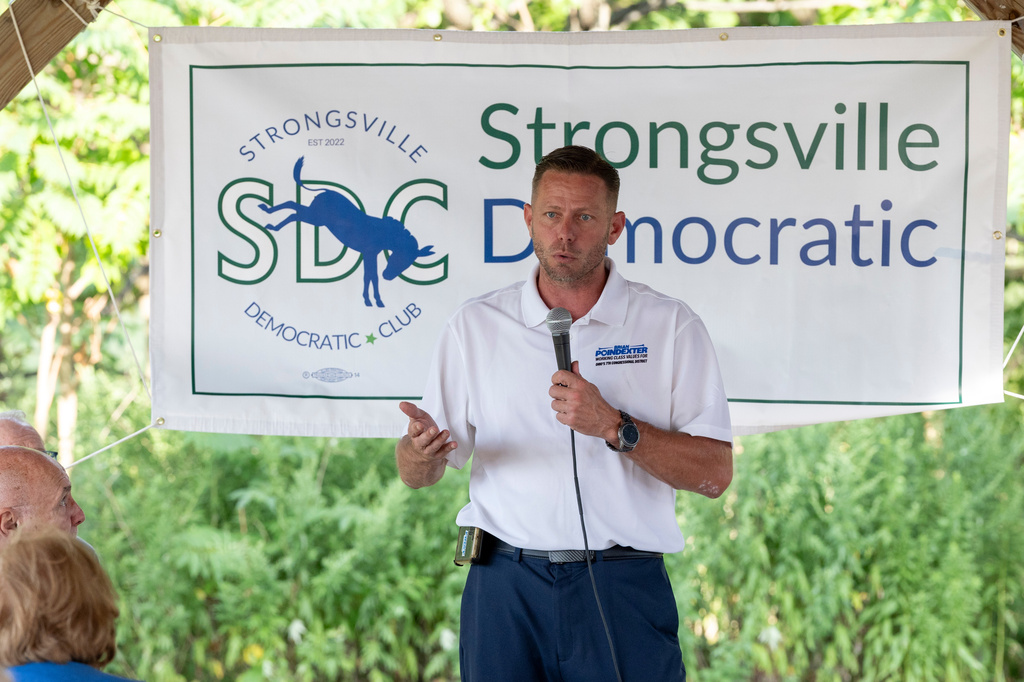 FILE - Brian Poindexter, Democratic nominee for Ohio's 7th congressional district, speaks at the Strongsville Democratic Club meeting, Aug. 5, 2026, in Strongsville, Ohio. (AP Photo/Nate Manley, File)