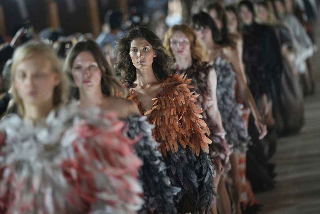 Model wear creations by Russian designer Alena Akhmadullina on a runway at Moscow Fashion Week in Moscow, Tuesday, Sept. 2, 2025. (AP Photo/Pavel Bednyakov)