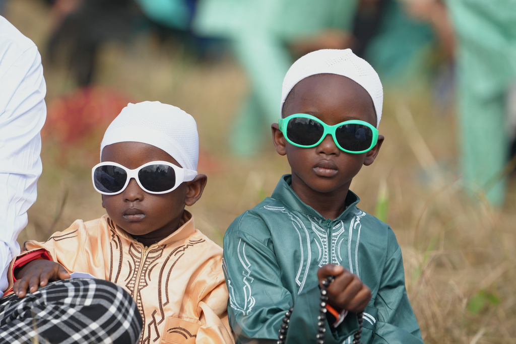 Muslim kids attend Eid al-Fitr prayers, marking the end of the fasting month of Ramadan in Lagos, Nigeria, Friday, March 20, 2026. (AP Photo/Sunday Alamba)