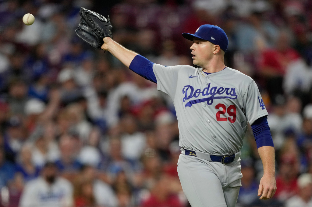 Los Angeles Dodgers pitcher Tarik Skubal take a throw during the fifth inning of a baseball game against the Cincinnati Reds, Monday, Sept. 14, 2026, in Cincinnati. (AP Photo/Carolyn Kaster)
