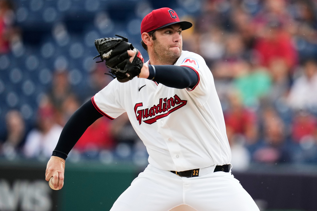 Cleveland Guardians' Gavin Williams pitches in the first inning of a baseball game against the Arizona Diamondbacks in Cleveland, Sunday, Aug. 2, 2026. (AP Photo/Sue Ogrocki)