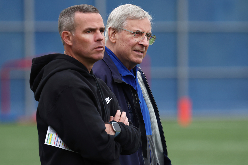 FILE - Buffalo Bills general manager Brandon Beane,Left and owner Terry Pegula look on during NFL football practice in Orchard Park, N.Y., Tuesday, June 11, 2024. (AP Photo/Jeffrey T. Barnes, File)