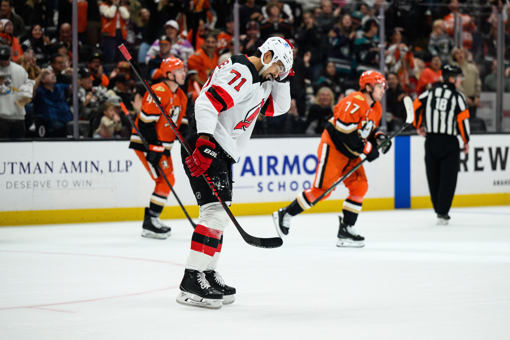 New Jersey Devils defenseman Jonas Siegenthaler (71) reacts after the Anaheim Ducks score during the first period of an NHL hockey game Sunday, Nov. 2, 2025, in Anaheim, Calif. (AP Photo/William Liang)