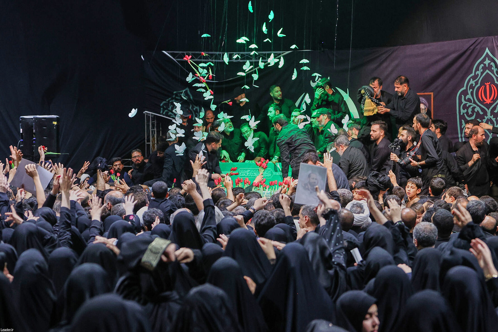 In this photo released by Iran's Supreme Leader's office, mourners gather around the coffin of Iran's Supreme Leader Ayatollah Ali Khamenei as it lies in a mourning hall adjacent to the Imam Khomeini Hussainiya within the Supreme Leader's compound before his funeral in Tehran, Iran, late Thursday, July 2, 2026. (Office of the Iranian Supreme Leader via AP)