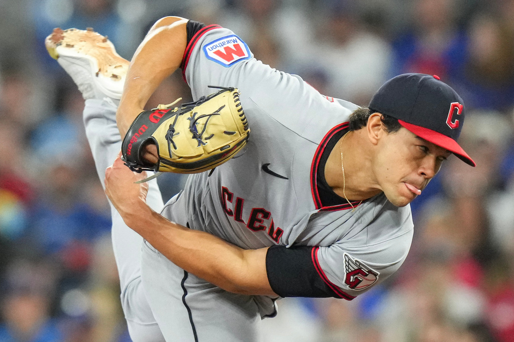 Cleveland Guardians pitcher Joey Cantillo (54) works against the Toronto Blue Jays during the first inning of a baseball game in Toronto, Saturday, April 25, 2026. (Chris Young/The Canadian Press via AP)