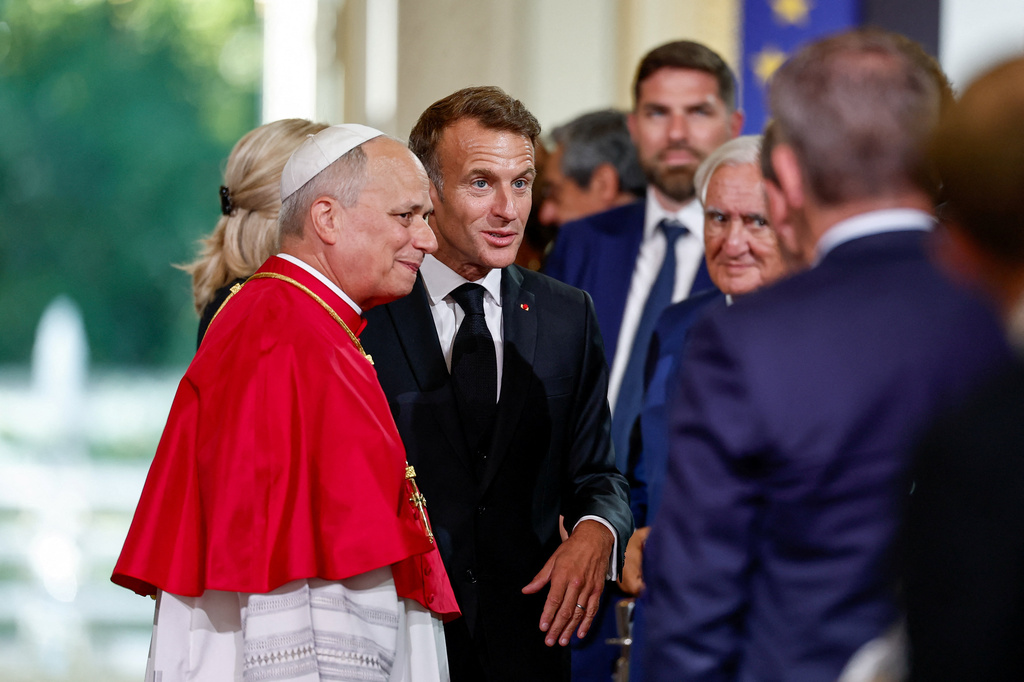 French President Emmanuel Macron and Pope Leo XIV at the Elysee Palace in Paris, Friday, Sept. 25, 2026. (Benoit Tessier/Pool Photo via AP)