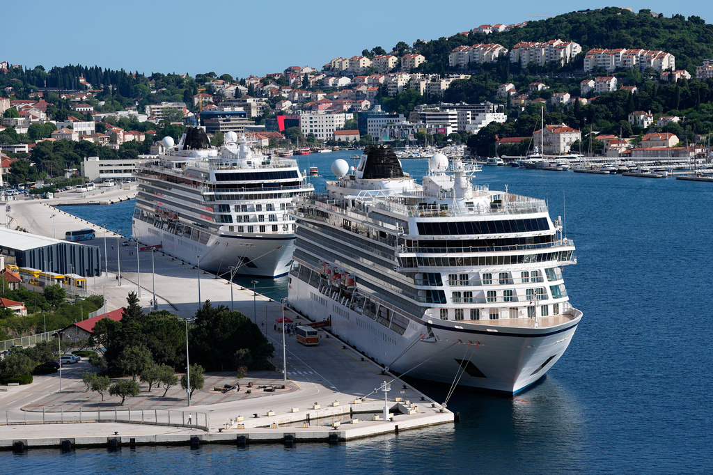 Cruise ships are moored in the port of Dubrovnik, Croatia, Wednesday, April 29, 2026. (AP Photo/Darko Bandic)